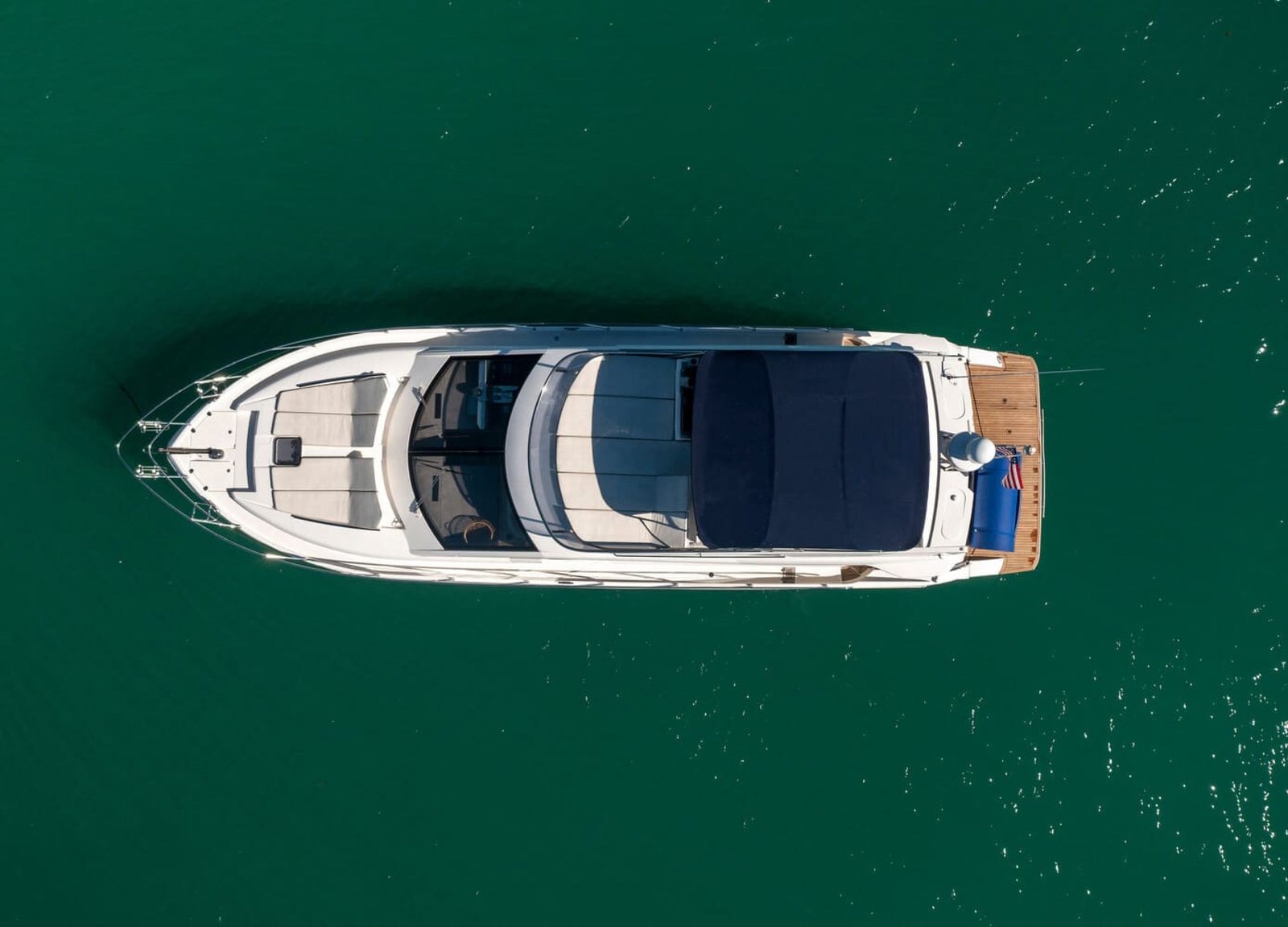 Aerial shot of the 60' ABSOLUTE FLY yacht, showcasing its top-down design and luxurious features.