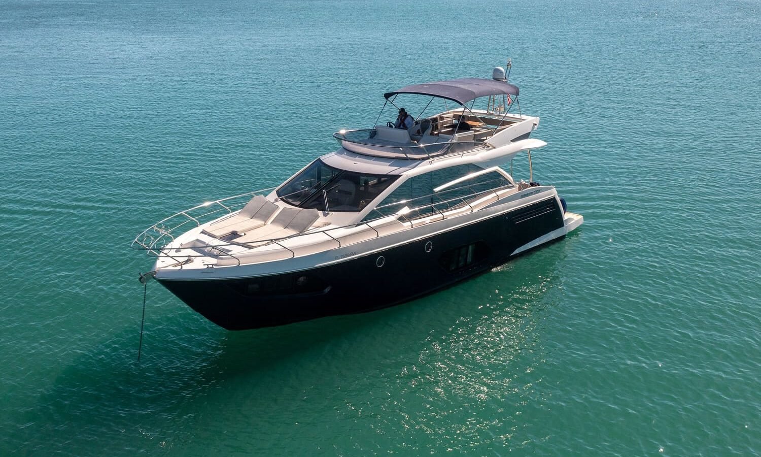 Stunning cover shot of the 60' ABSOLUTE FLY yacht, showcasing its sleek exterior and luxurious design.